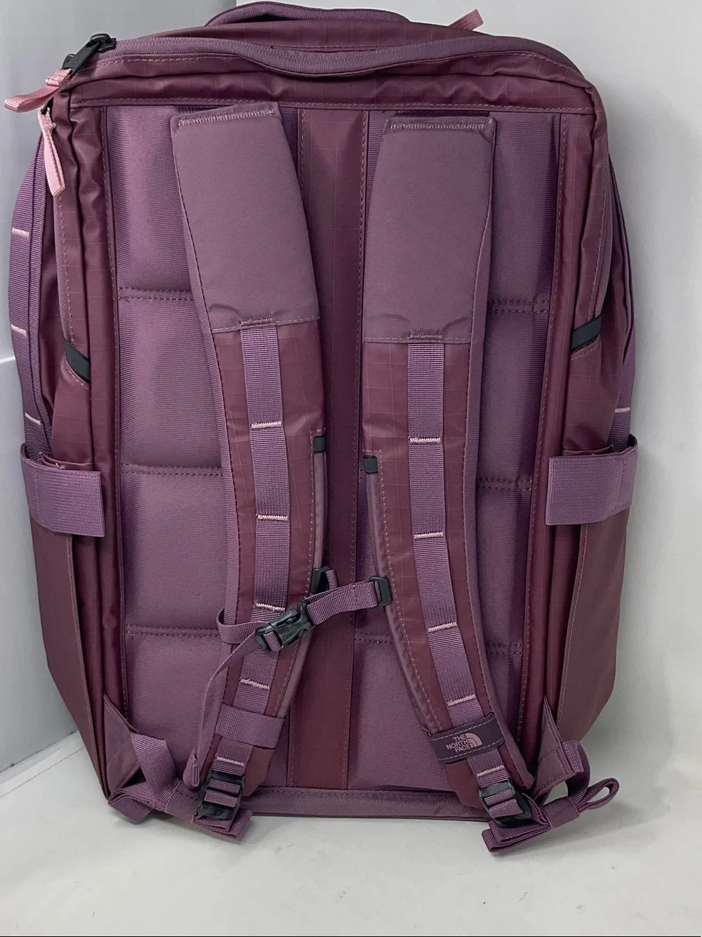 The North Face Backpack in Plum with Pink Logo